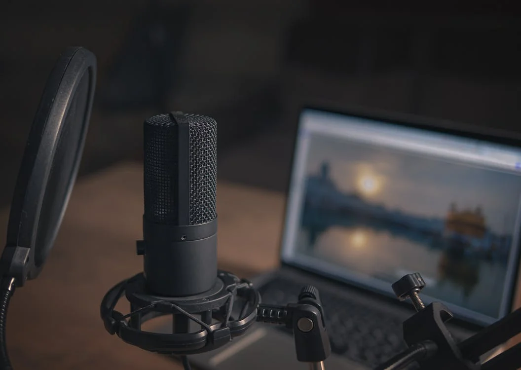 Streaming showcase - Studio microphone on desk with production setup